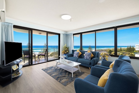 2 Bed Ocean View Apartment -Floors 10-16 | Living area | TV. South Pacific Plaza