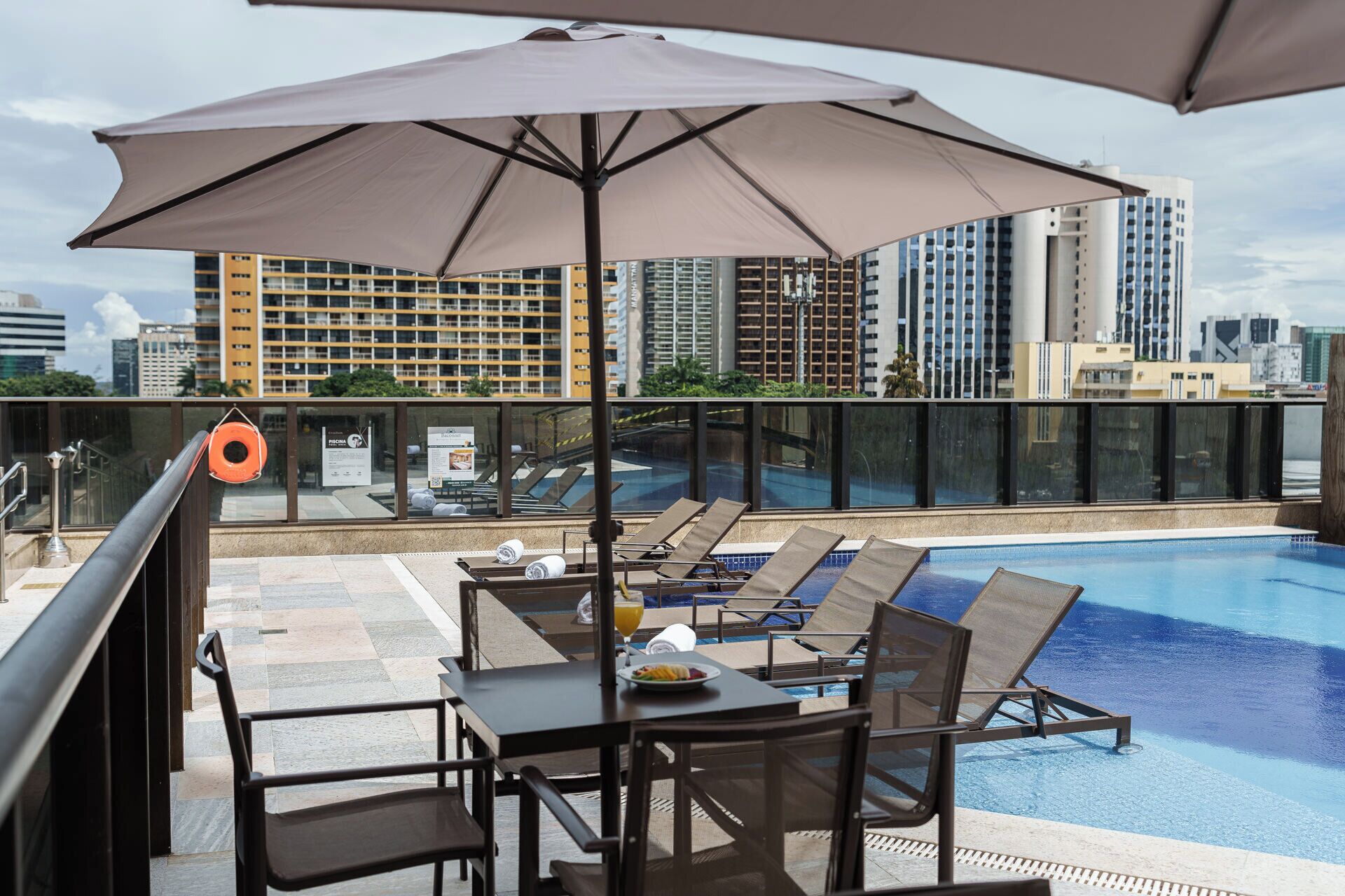 outdoor pool, pool umbrellas, pool loungers