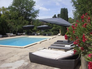Outdoor pool, pool umbrellas, sun loungers