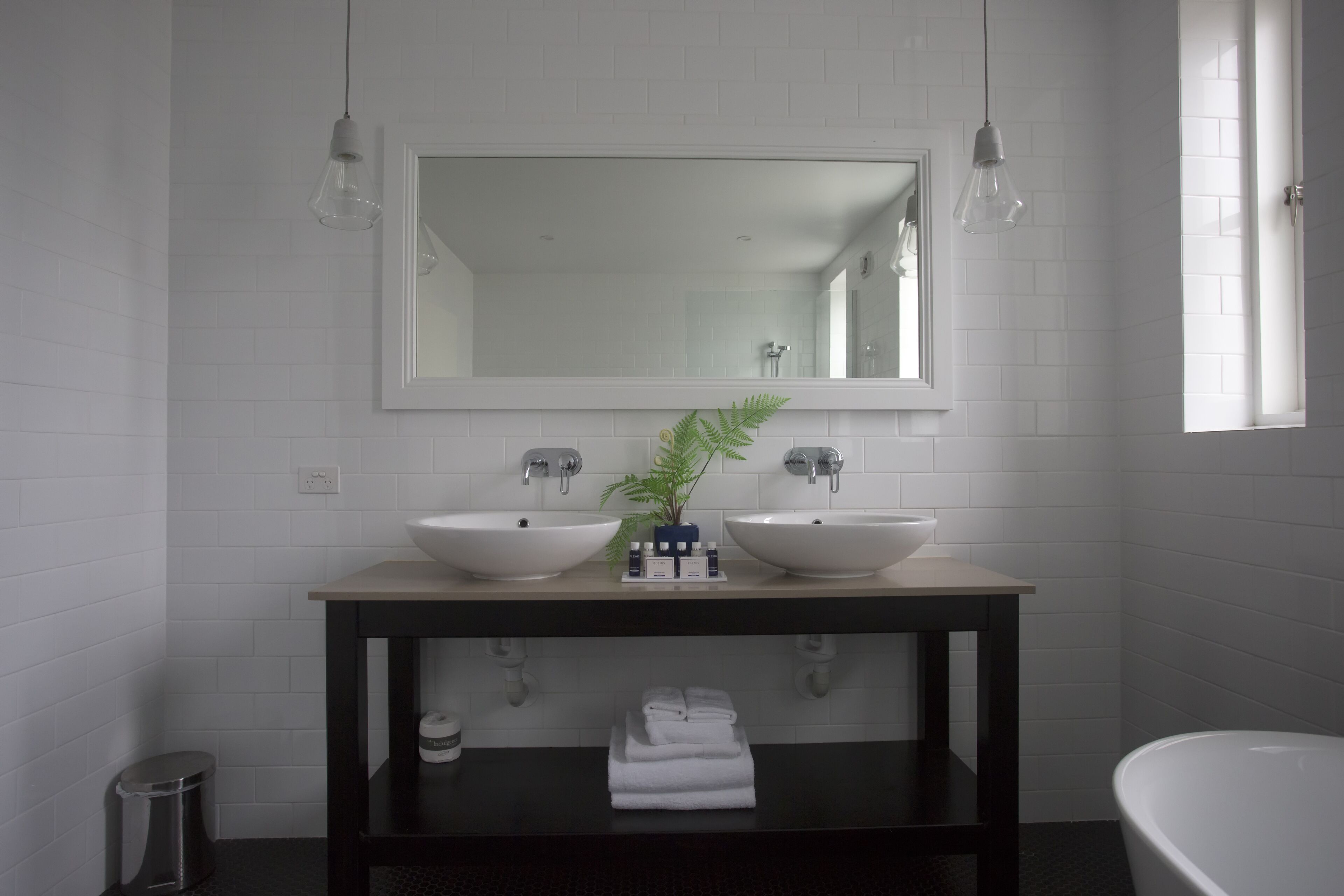 deluxe suite | bathroom | free toiletries, hair dryer, soap, shampoo