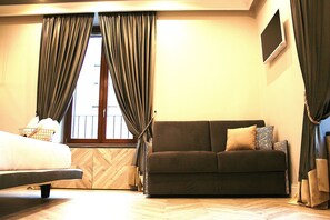 Deluxe-Dreibettzimmer, 1 Doppelbett und Schlafsofa