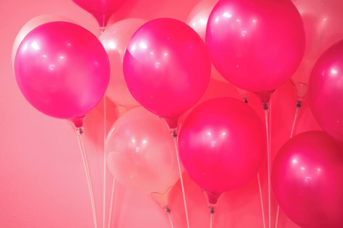 A cluster of balloons tied together.