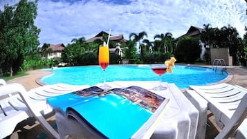 Outdoor pool, pool umbrellas, pool loungers