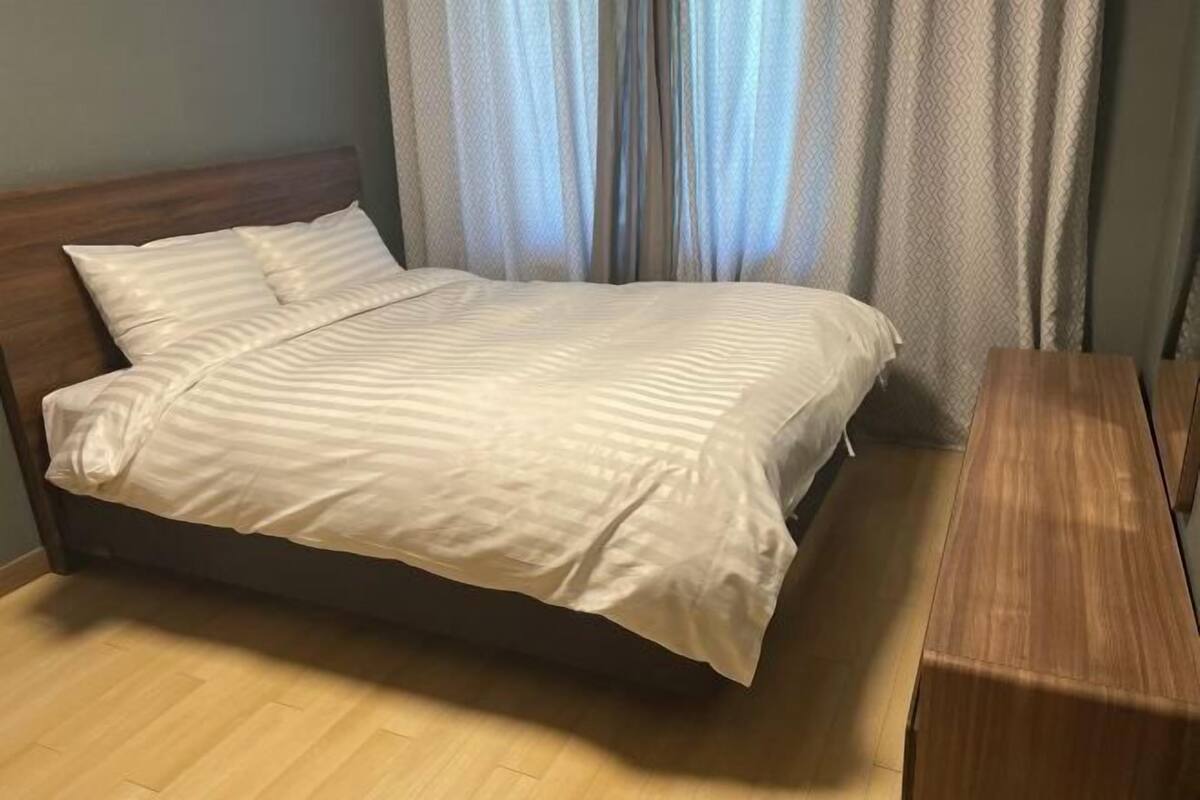 Premium bedding, blackout drapes, soundproofing, WiFi (free)