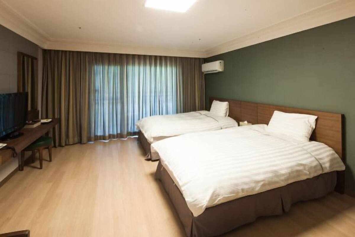Premium bedding, blackout drapes, soundproofing, WiFi (free)
