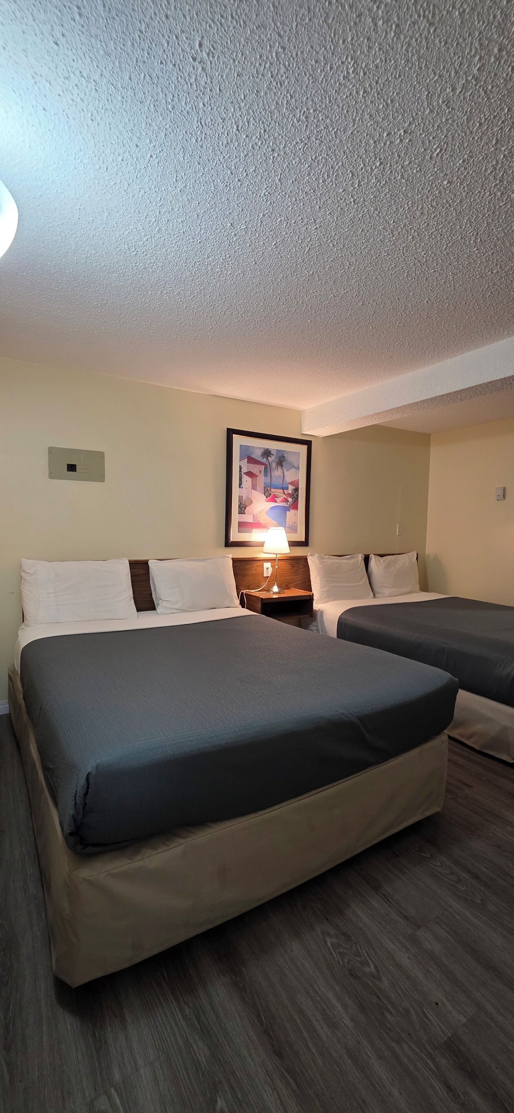 Room, 2 Queen Beds (Lower Level - Basement) | Desk, blackout curtains, iron/ironing board, free WiFi