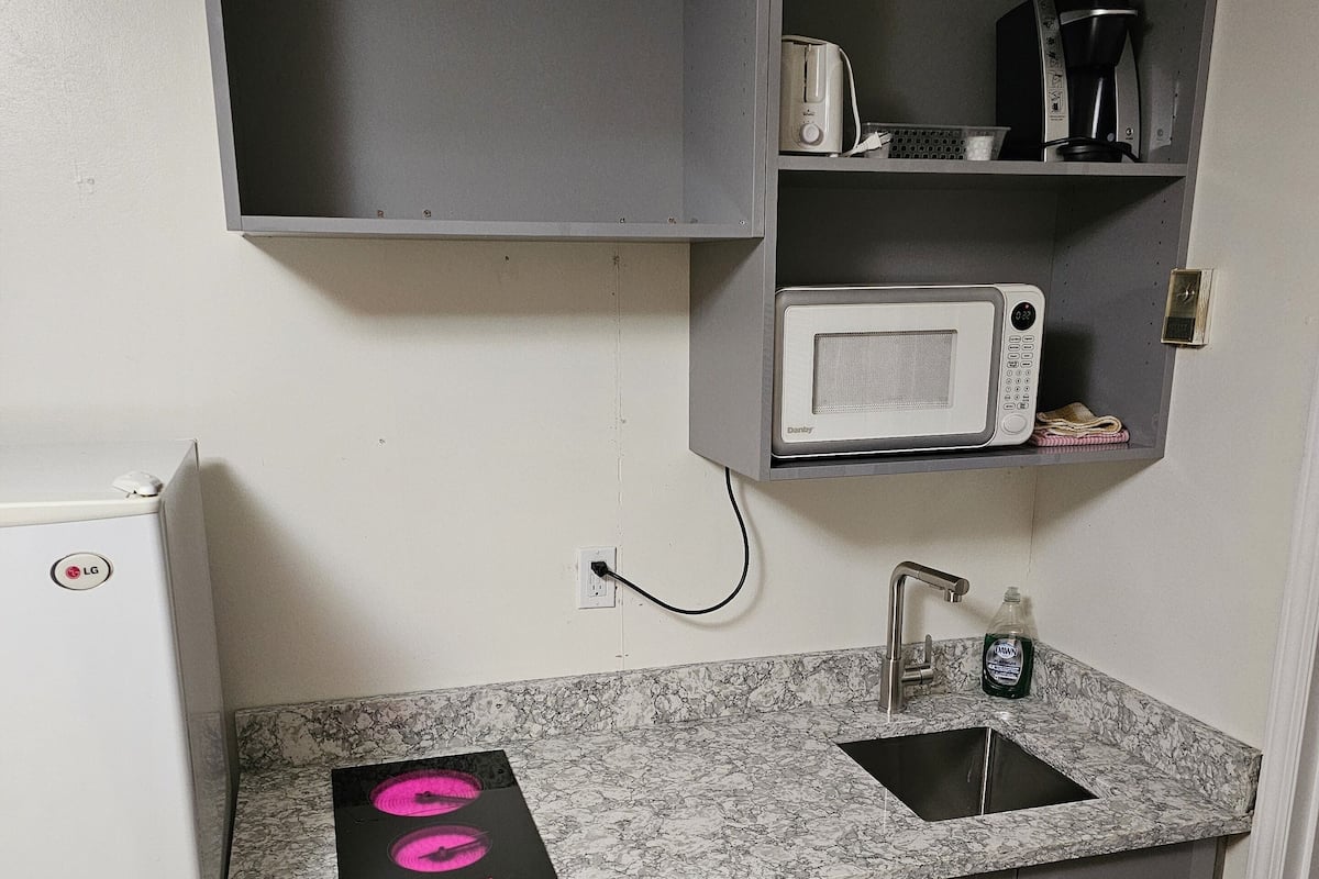 Desk, blackout drapes, iron/ironing board, free WiFi