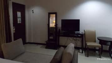 Luxury Suite, 1 King Bed | Living area | LCD TV