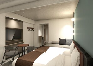 A hotel room with a bed, a TV, a small table, a chair, and a sofa.
