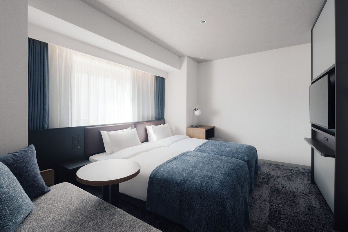 Chambre supérieure avec lits jumeaux, non-fumeur | Fer et planche à repasser, accès au Wi-Fi (inclus), literie fournie