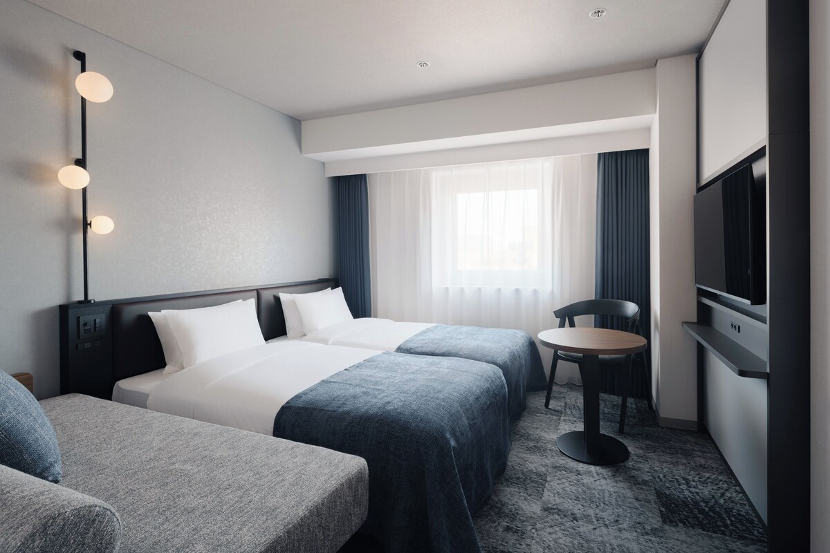 Chambre avec lits jumeaux, non-fumeur (Moderate) | Fer et planche à repasser, accès au Wi-Fi (inclus), literie fournie