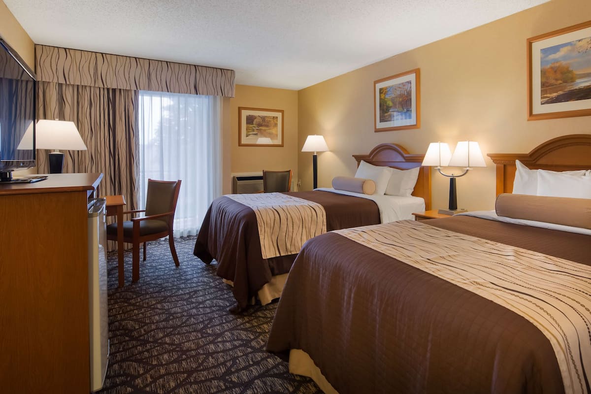 Desk, laptop workspace, blackout curtains, iron/ironing board