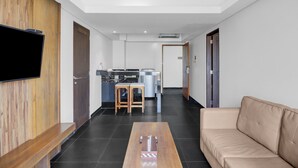 Suite Deluxe | Minibar, coffre-fort, bureau, rideaux d’obscurcissement