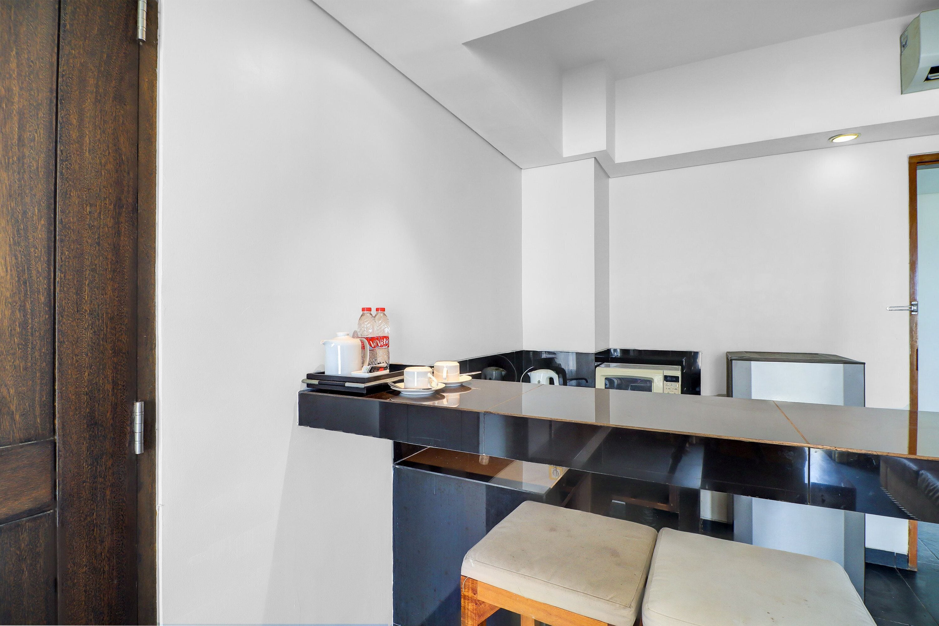 Suite Deluks | Minibar, brankas, meja kerja, dan tirai kedap cahaya