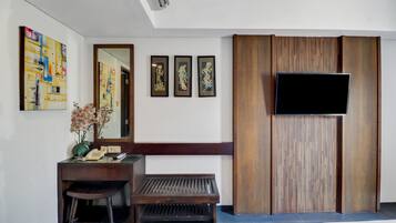 Suite Deluxe | Minibar, caja fuerte, escritorio y cortinas opacas