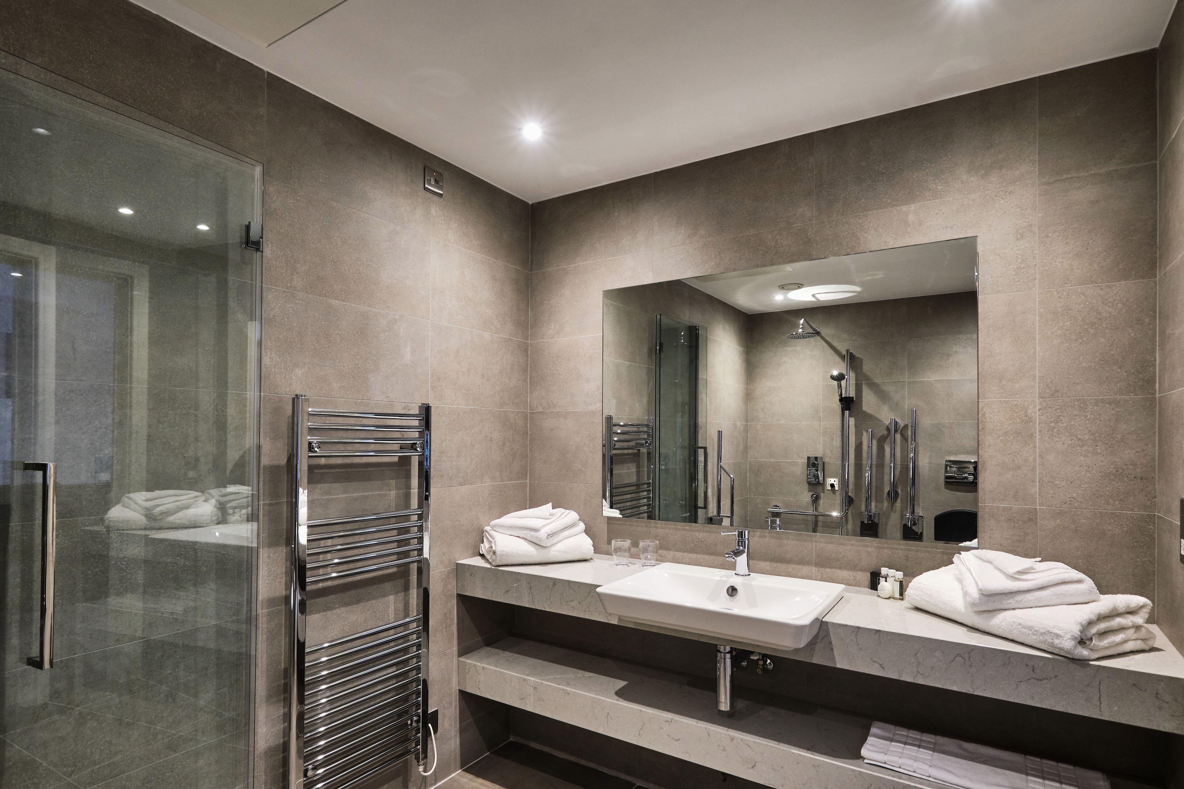 superior double room, accessible (disabled room) | bathroom | hair dryer, towels, soap, shampoo