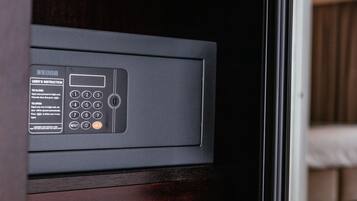 A close-up of a microwave with a control panel, including a keypad and a digital display.