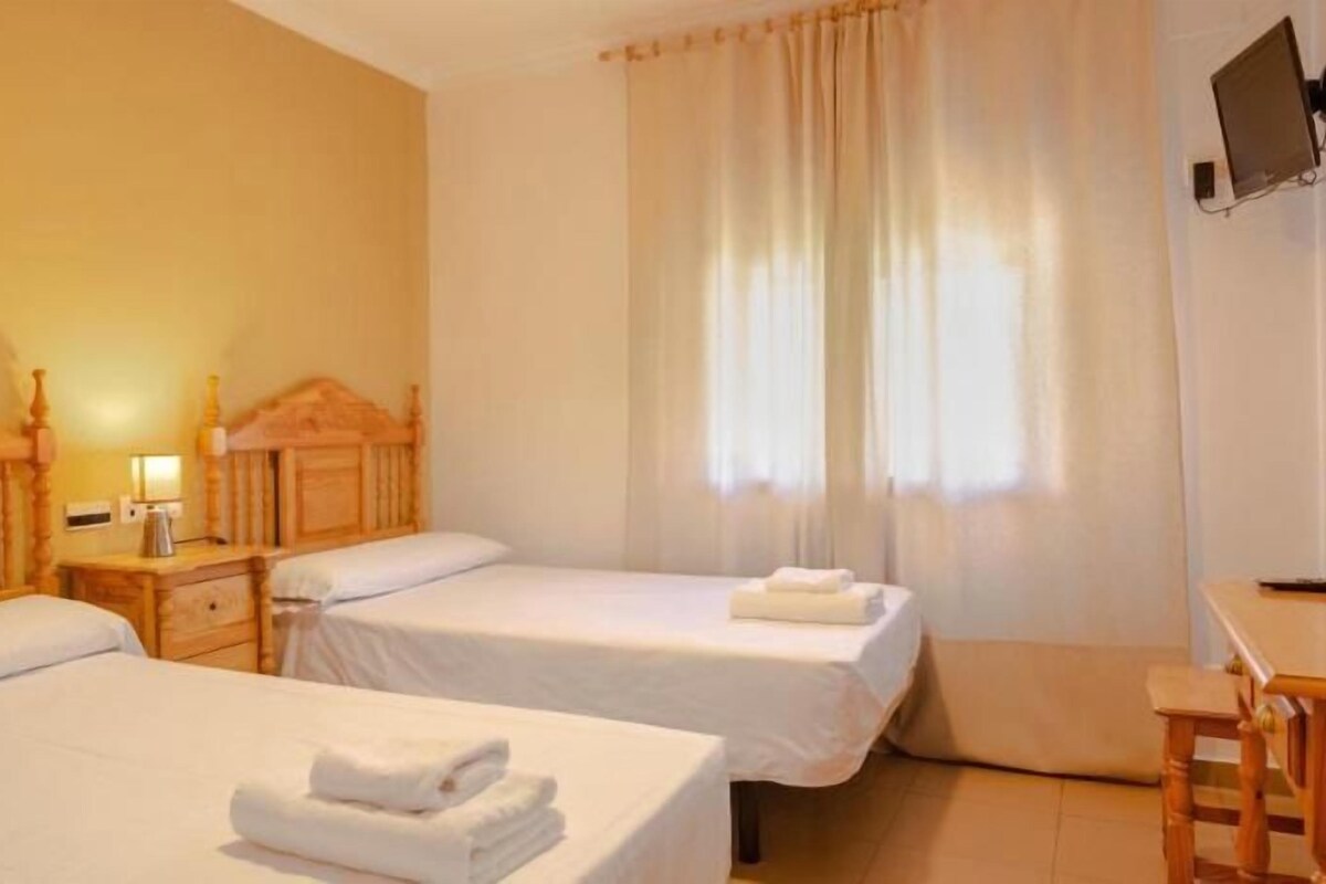 Escritorio, insonorización, wifi gratis y ropa de cama 