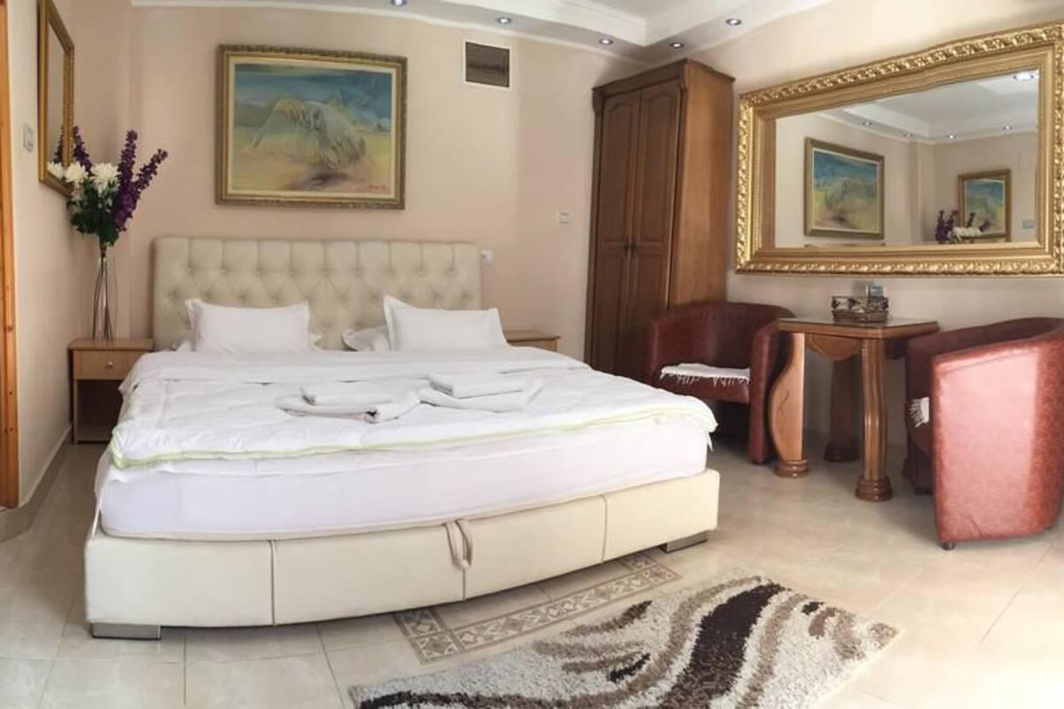 Suite (Elegance) | Premium bedding, Select Comfort beds, desk, blackout drapes