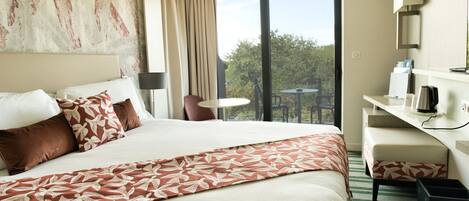 Chambre Double Classique, vue jardin | Literie de qualité supérieure, minibar, coffres-forts dans les chambres