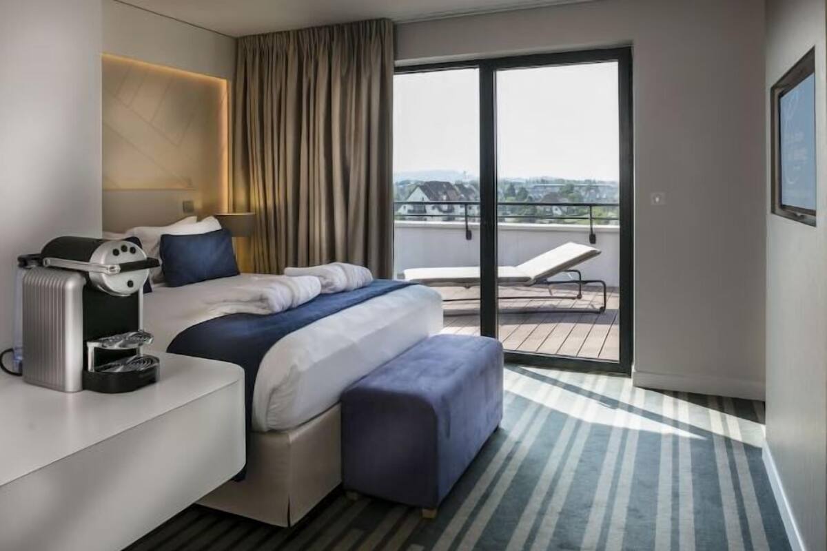 1 Schlafzimmer, hochwertige Bettwaren, Minibar, Zimmersafe