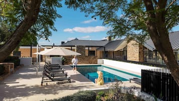 Outdoor pool, pool umbrellas, sun loungers