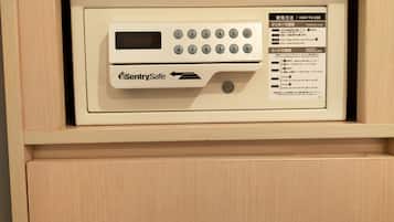 A SentrySafe safe in a wooden cabinet.