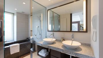 Shower, free toiletries, hair dryer, slippers