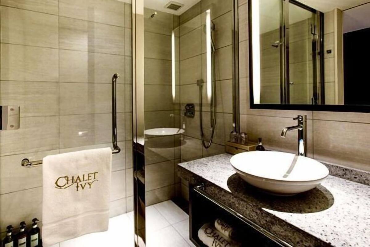 Shower, free toiletries, hair dryer, slippers