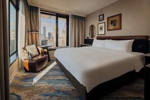 Room, 1 King Bed (City XL) | Living area | 55-inch flat-screen TV with cable channels