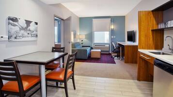 Suite, 1 Queen Bed, Accessible, Bathtub | Living area | 42-inch LCD TV with premium channels, TV