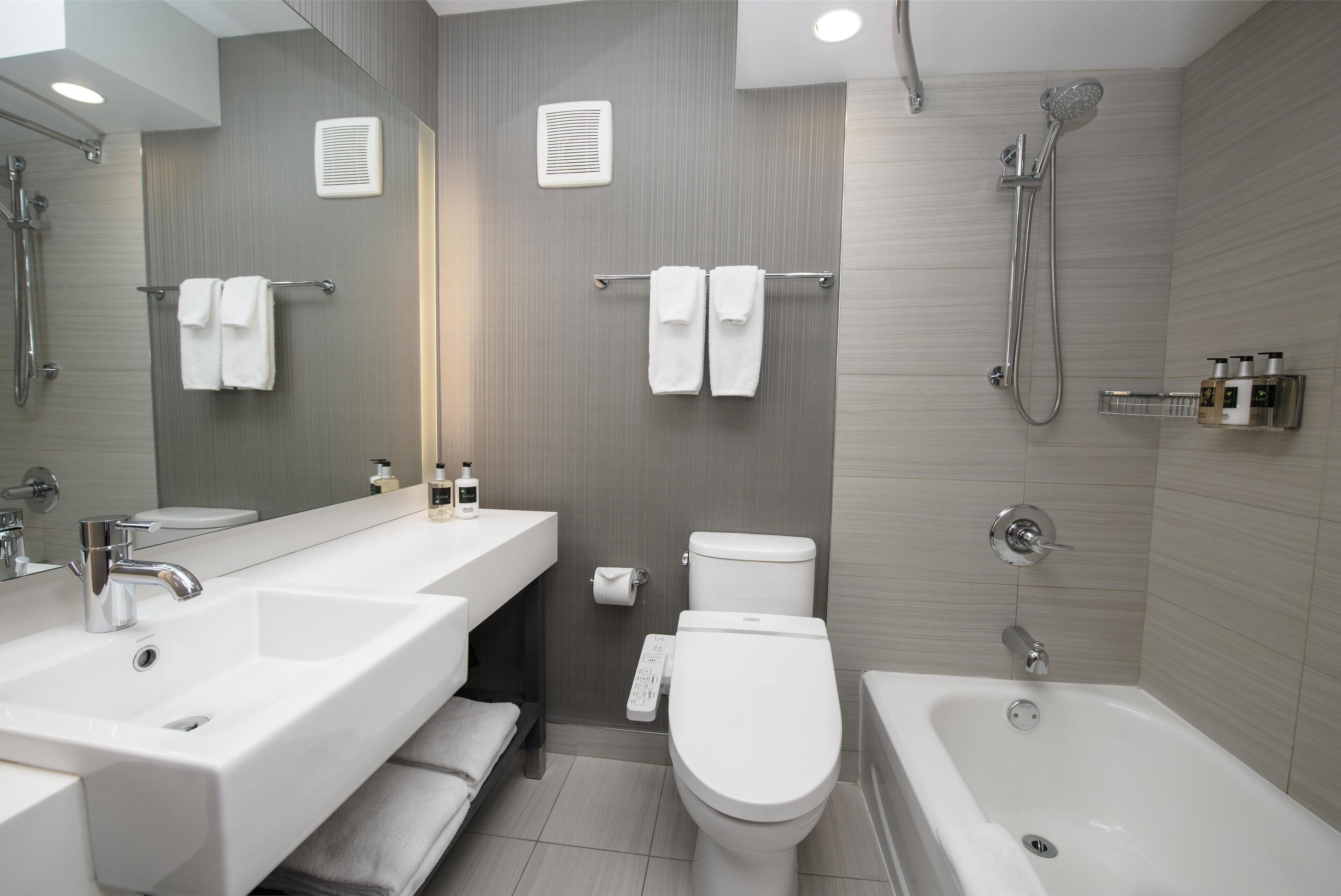 room, 1 queen bed (coast queen - not pet friendly) | bathroom | free toiletries, hair dryer, electronic bidet, towels