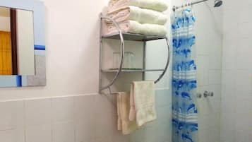 Shower, rainfall showerhead, free toiletries, hair dryer