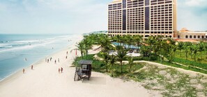 On the beach, sun loungers, beach umbrellas, beach towels - InterContinental Grand Ho Tram by IHG (Ho Chi Minh City)