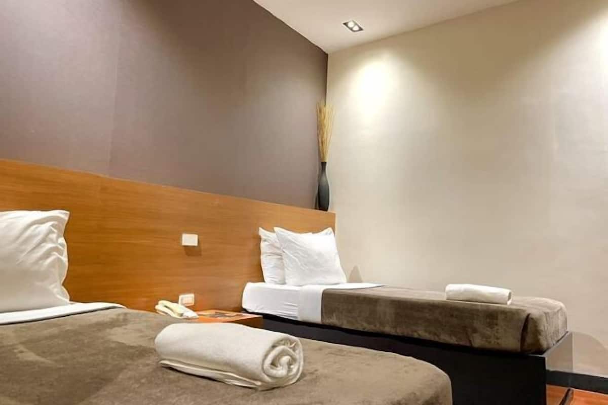 Laptop workspace, free WiFi, bed sheets
