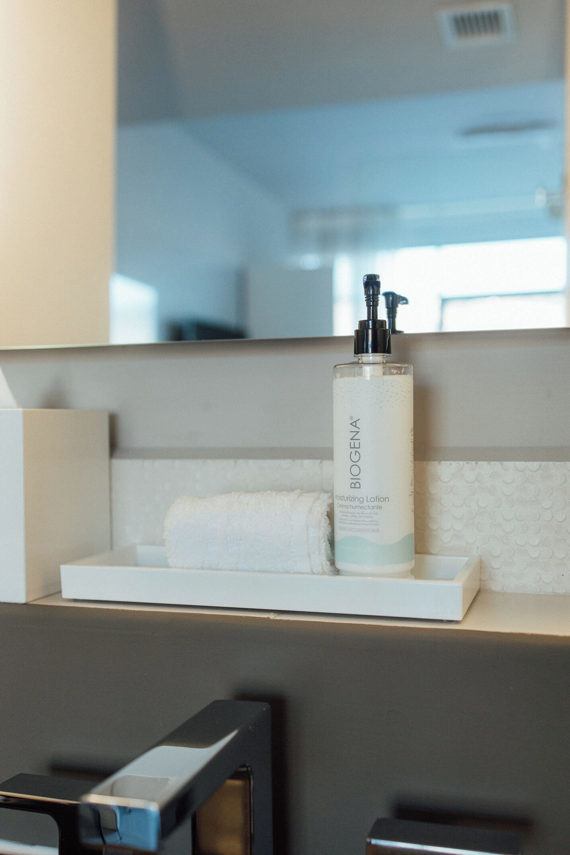 executive twin room | bathroom | rainfall showerhead, designer toiletries, hair dryer, towels