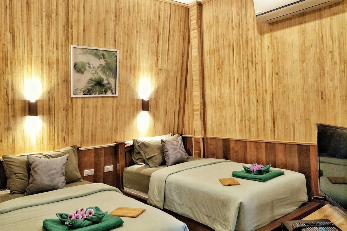 deluxe bungalow, 2 bedrooms, non smoking, partial sea view | 1 bedroom, minibar, in-room safe, desk