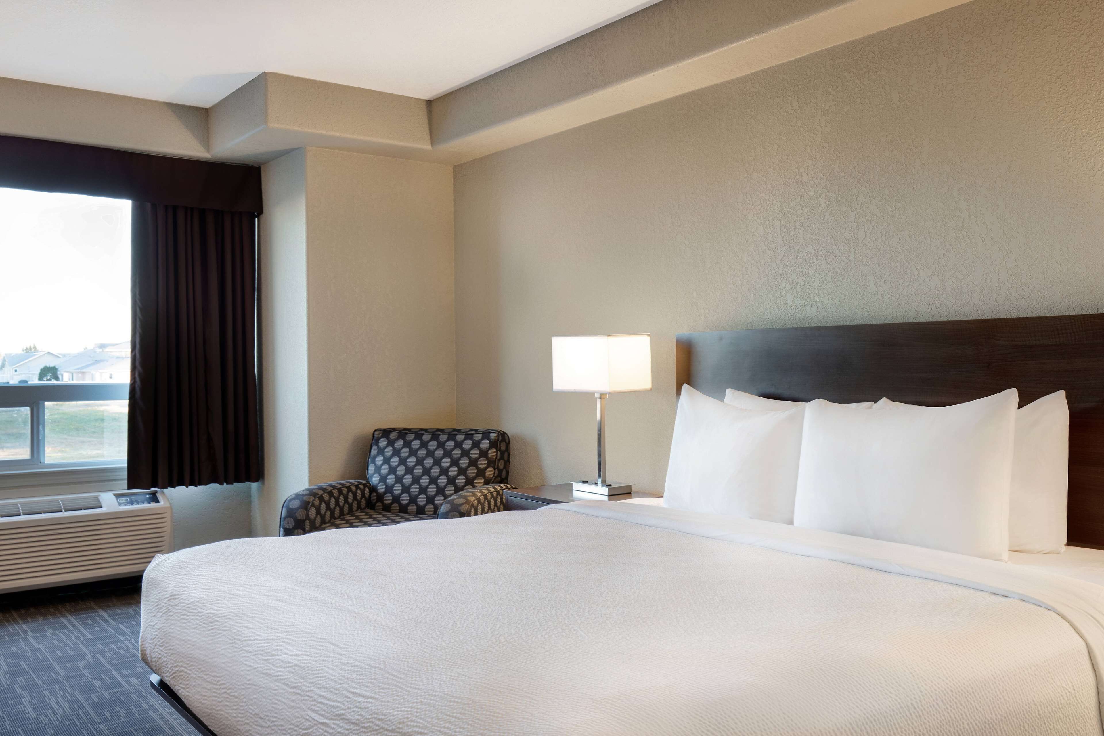 desk, laptop workspace, blackout curtains, iron/ironing board