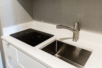 Mini-fridge, microwave, coffee/tea maker at Polynesian Residences Waikiki Beach