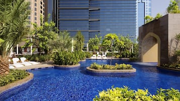 Outdoor pool, open 7:00 AM to 8:00 PM, pool cabanas (surcharge)