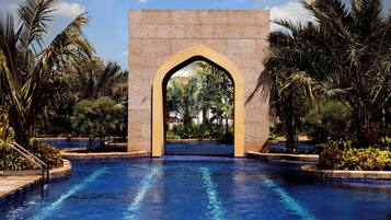 Outdoor pool, open 7:00 AM to 8:00 PM, cabanas (surcharge)
