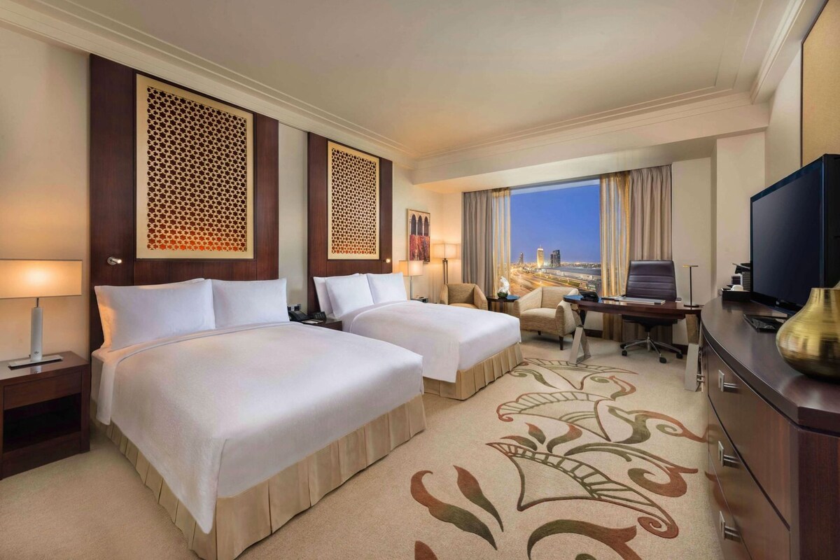 Ropa de cama de alta calidad y minibar 