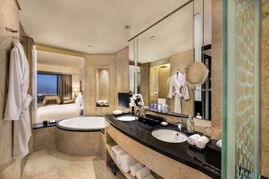 Rainfall showerhead, designer toiletries, hair dryer, bathrobes