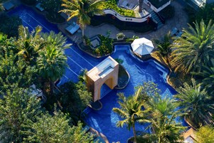 Outdoor pool, open 7:00 AM to 8:00 PM, cabanas (surcharge)