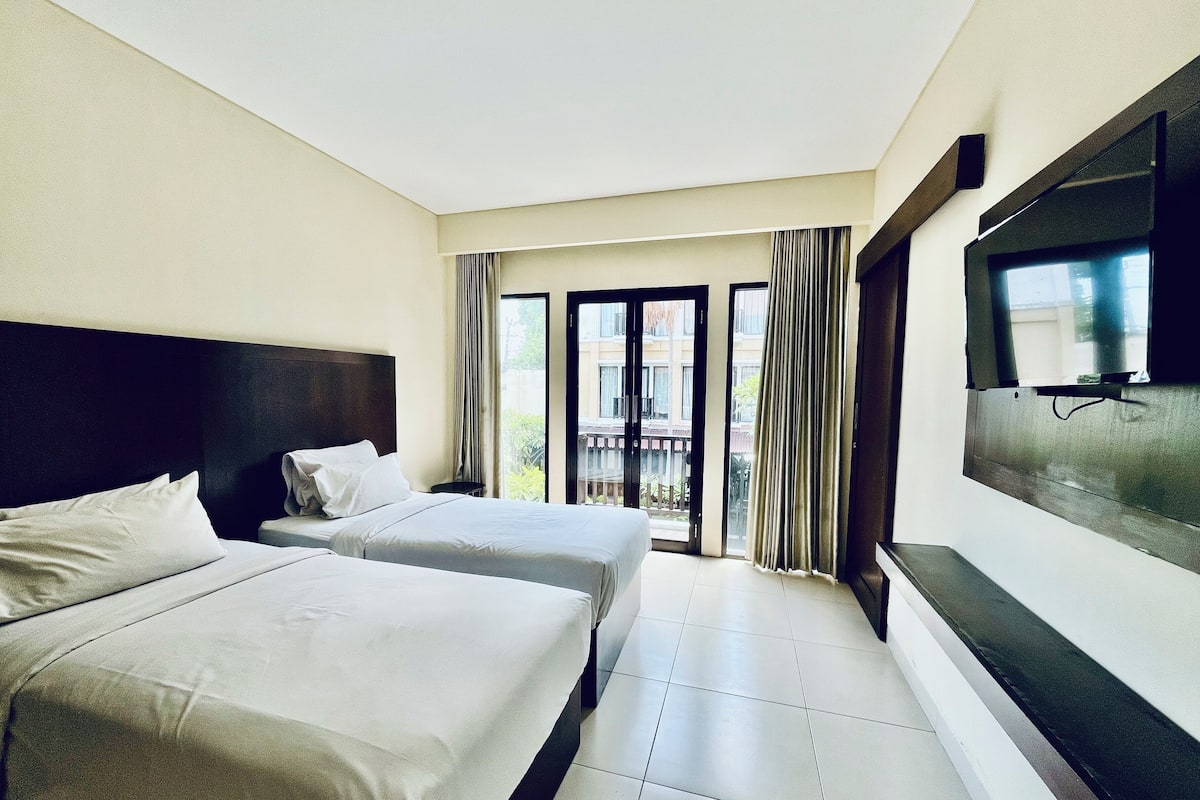 Luxe beddengoed, een kluis op de kamer, een bureau