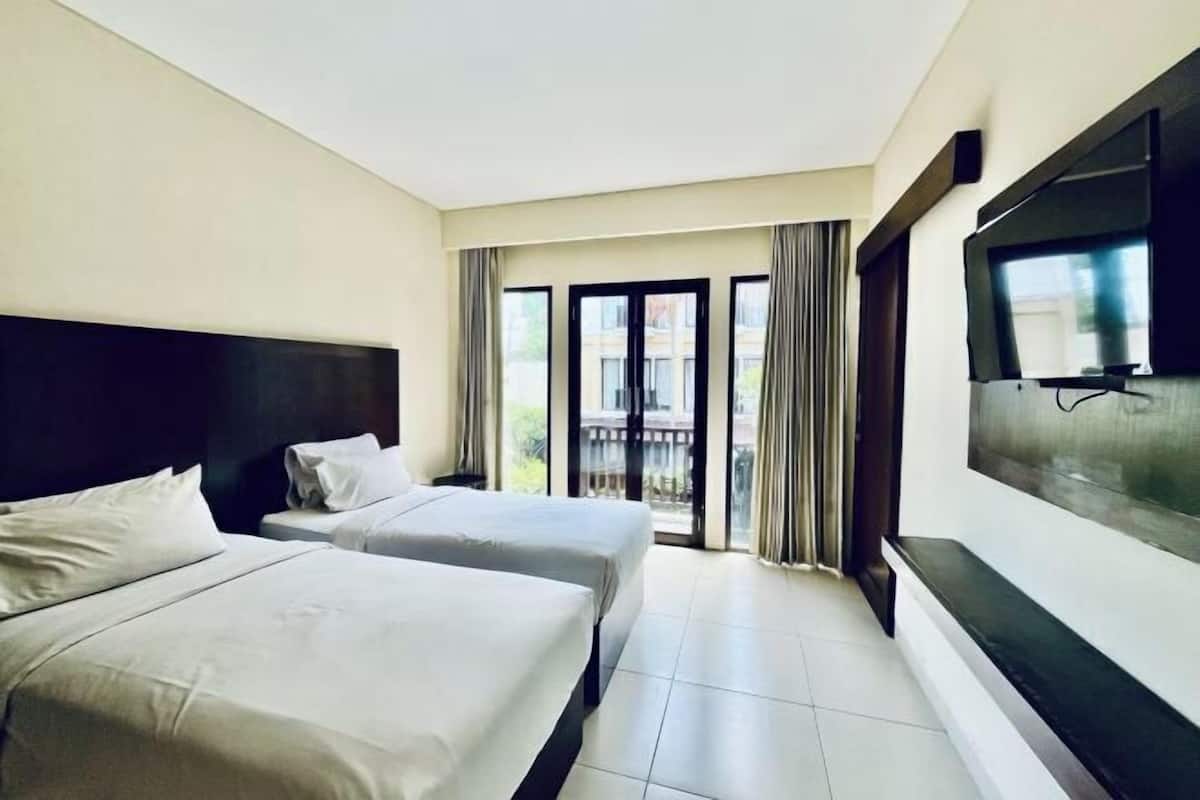 Luxe beddengoed, een kluis op de kamer, een bureau