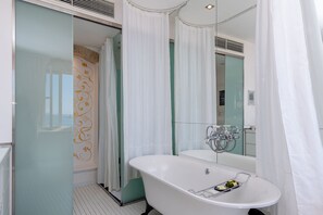 Junior Suite, Sea View | Bathroom | Designer toiletries, hair dryer, bathrobes, towels