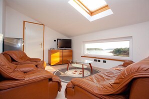 Familienapartment, 2 Schlafzimmer, Küche, zum Garten hin | Badezimmer | Dusche, kostenlose Toilettenartikel, Haartrockner, Handtücher