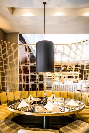 Breakfast, lunch, dinner served; international cuisine