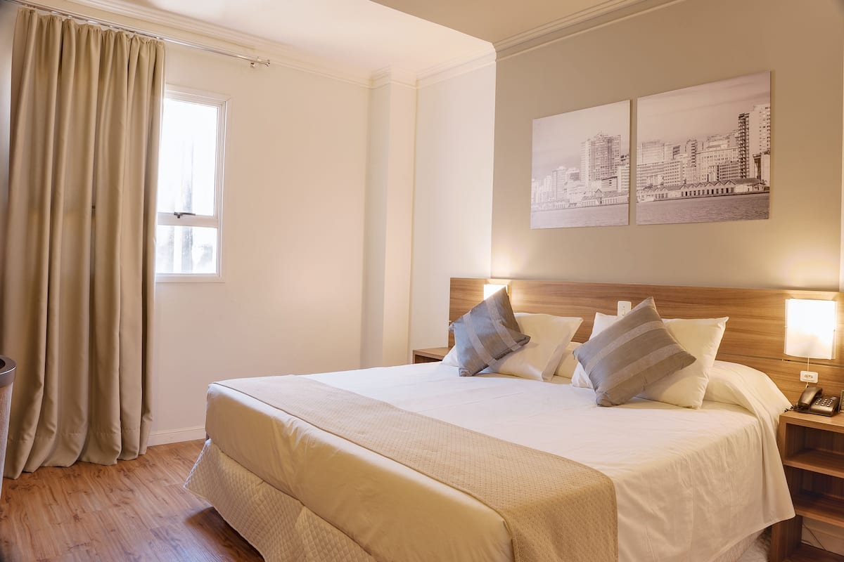 Superior Double Room | Minibar, in-room safe, desk, blackout drapes